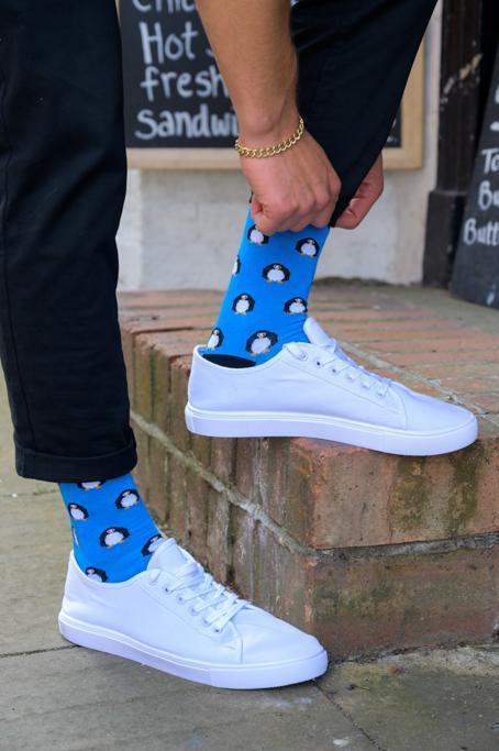 Penguin in blue socks by Swole Panda
