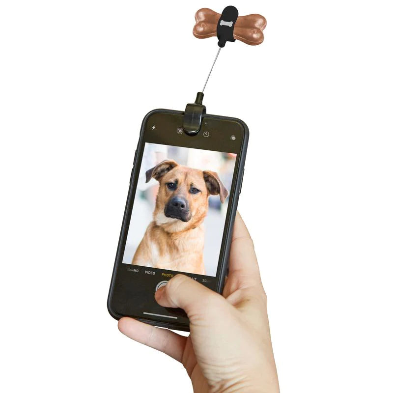 Dog treat selfie clip by Kikkerland