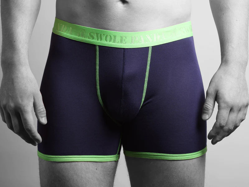 Navy and green trunks by Swole Panda